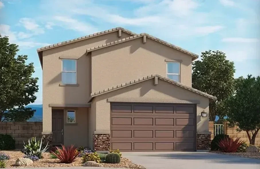 Newly built desert-landscaped home with stone accents and a wide driveway