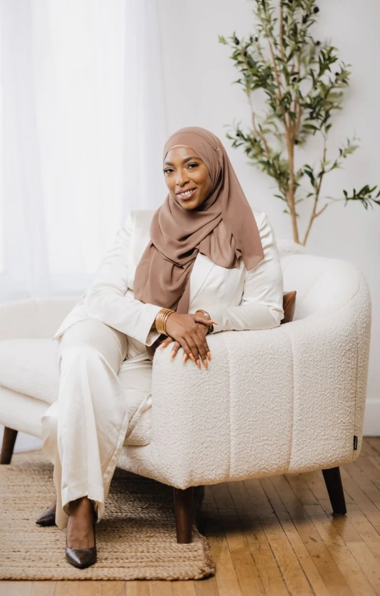 Founder of Nate's 2nd Chance Housing seated in a bright, welcoming living room